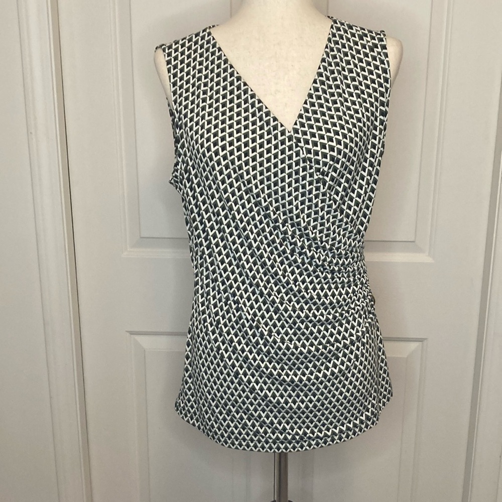 Tahari v-neck no sleeve rusched top.Olive green, black, cream geo print. Size M